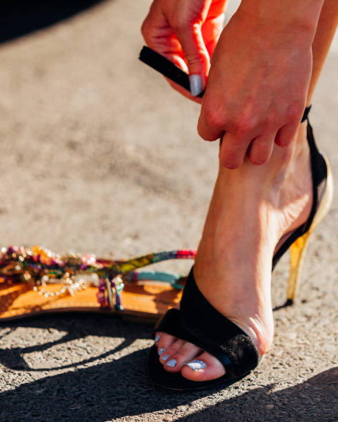 istock Girl changing shoes. 1279800697