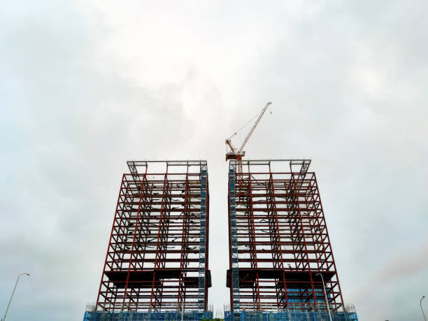 The building under construction. Steel Structure and the sky. Imagery is about background, construction, and architecture. structural steel stock pictures, royalty-free photos & images