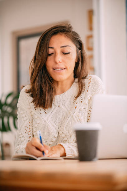 istock Female Student Home Schooling During Covid-19 1279803696