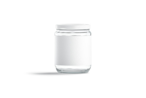 Blank glass jar with white label and cap mockup, isolated, 3d rendering. Empty storage canister with sticker mock up, front view. Clear glas utensil for jam or juice preservation template.