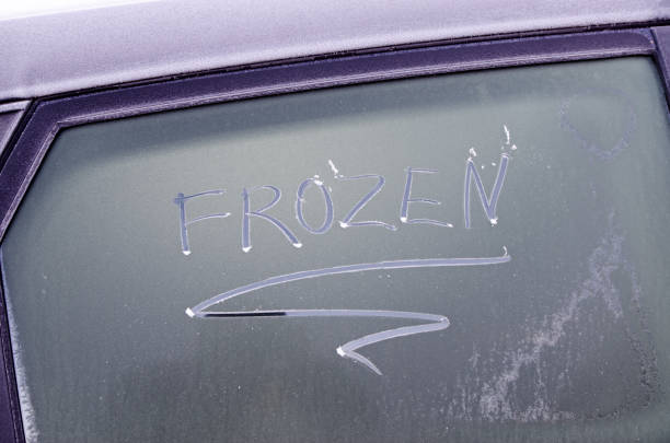 istock FROZEN written on a frosted car window 1279804274