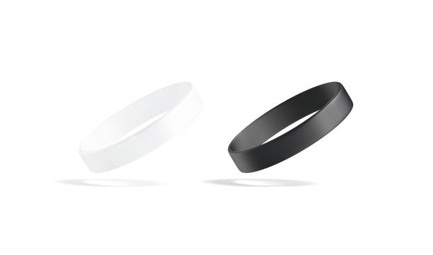 istock Blank black and white silicone wristband mockup set, no gravity 1279806168