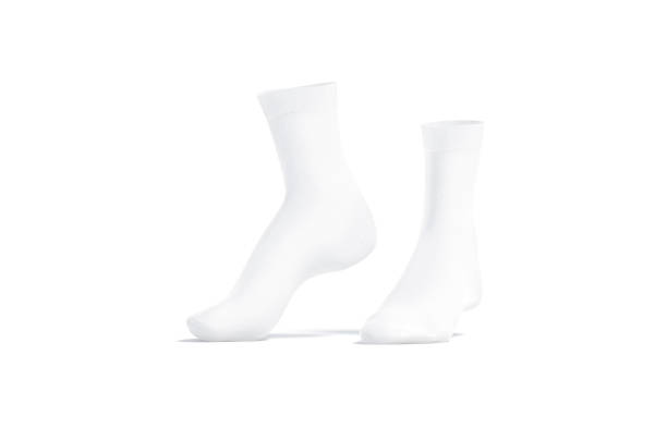 Blank white long socks mockup pair on tiptoe, side view Blank white long socks mockup pair on tiptoe, side view, 3d rendering. Empty sporty cotton quarter kneehighs mock up, isolated. Clear wool or textile leg underwear accessories template. anklet feet stock pictures, royalty-free photos & images