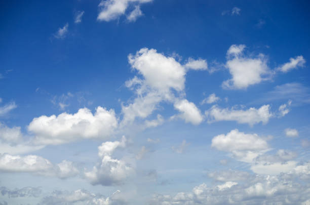 istock beautiful blue sky and white fluffy cloud horizon outdoor for background. 1279808425