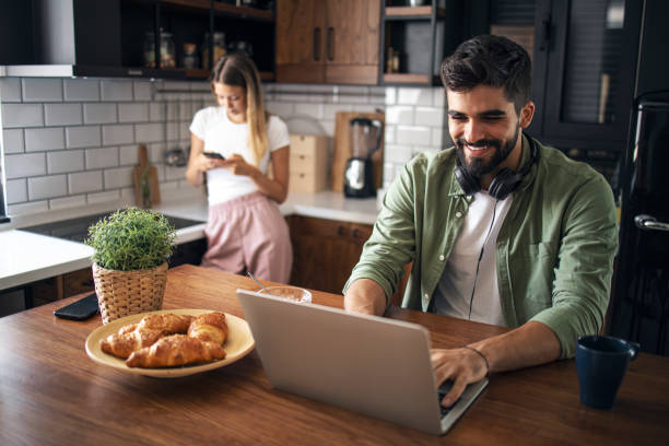 istock Young couple in the kitchen 1279810076