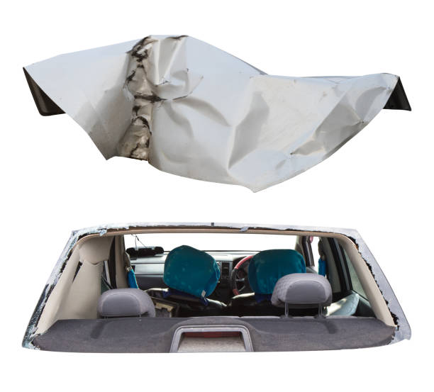 Isolated car parts, devastated by an accident.