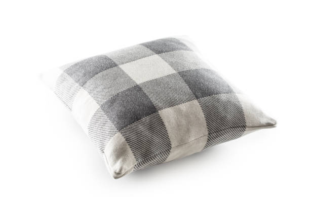 istock Grey and white checkered textile pillow on an isolated white background 1279811164