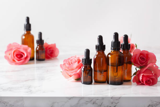istock essential oils in bottles rose flowers. alternative medicine aromatherapy 1279811398