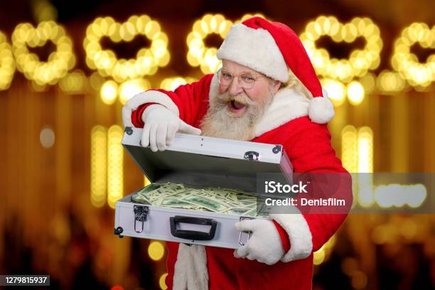 Happy Santa Claus On Blurred Background Stock Photo - Download Image Now - Currency, Opening, Full