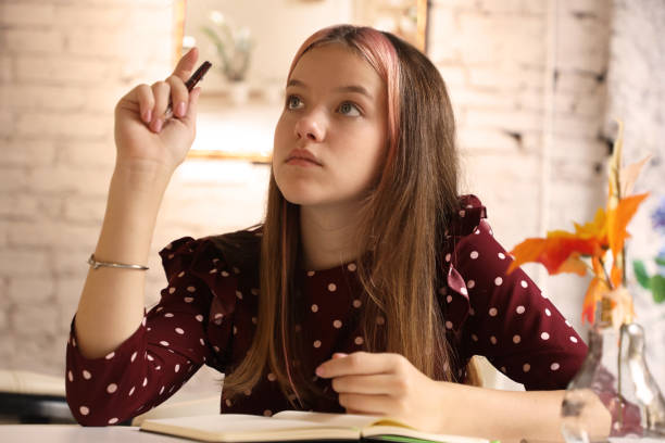 istock young beautiful girl sitting relaxing and thinking 1279820153