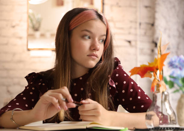 istock young beautiful girl sitting relaxing and thinking 1279820155