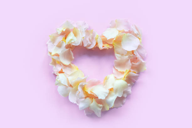 istock Festive card for Valentine\'s Day. Frame from pink rose petals. Copy space 1279820674