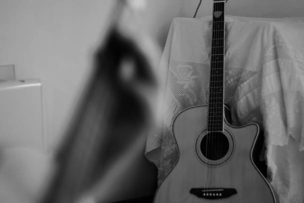 istock Close up of hands playing the ukulele 1279821449