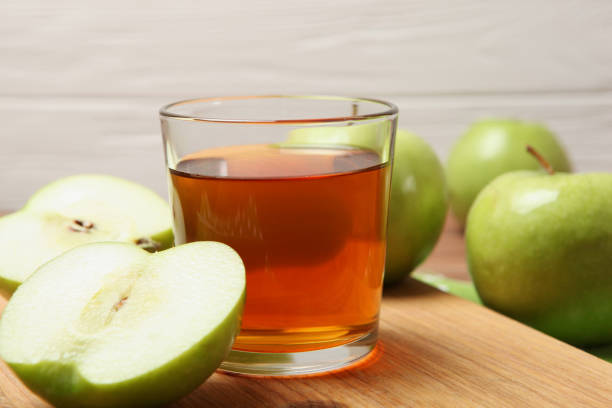istock juice from green apples on the table. 1279821714