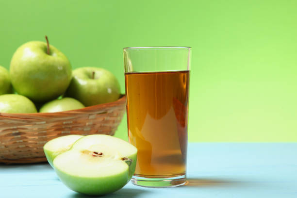 istock juice from green apples on the table. 1279821823