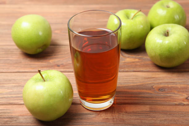 istock juice from green apples on the table. 1279821824