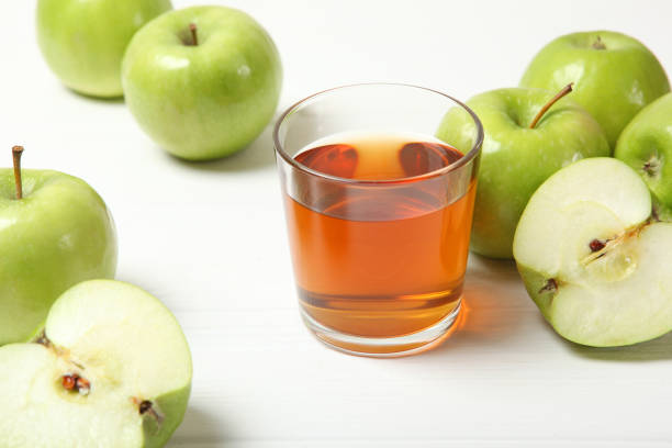 istock juice from green apples on the table. 1279821865