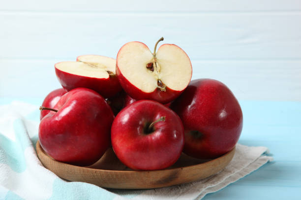 istock ripe juicy red apples on the table. 1279823055