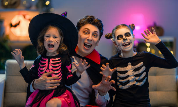 istock Happy family celebrating Halloween 1279825829