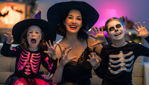 istock Happy family celebrating Halloween 1279825833