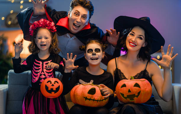 istock Happy family celebrating Halloween 1279825845