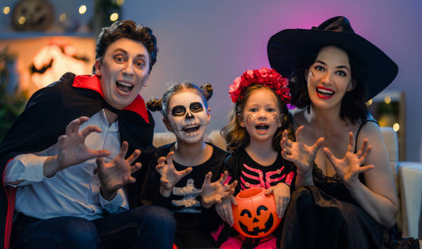 istock Happy family celebrating Halloween 1279825863