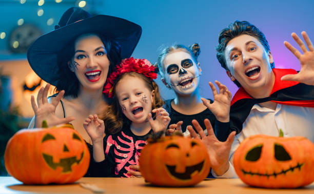 istock Happy family celebrating Halloween 1279825866