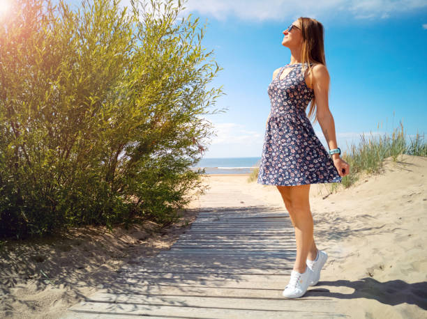 istock girl on the beach 1279826416