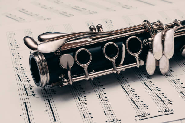 istock Close-up of musical notes and clarinet. 1279827143