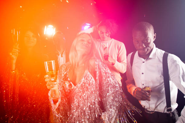 istock People dance at retro style party 1279827403