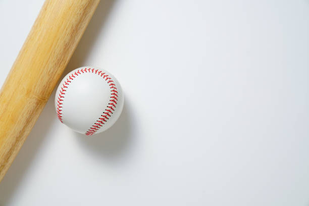 istock baseball and baseball bat on white background, top view 1279827915