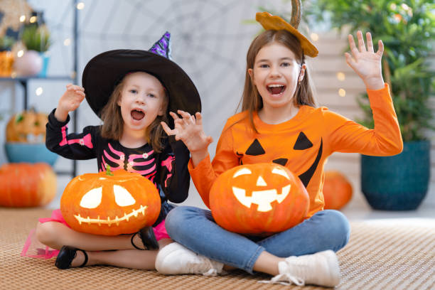 istock Happy family celebrating Halloween 1279828550