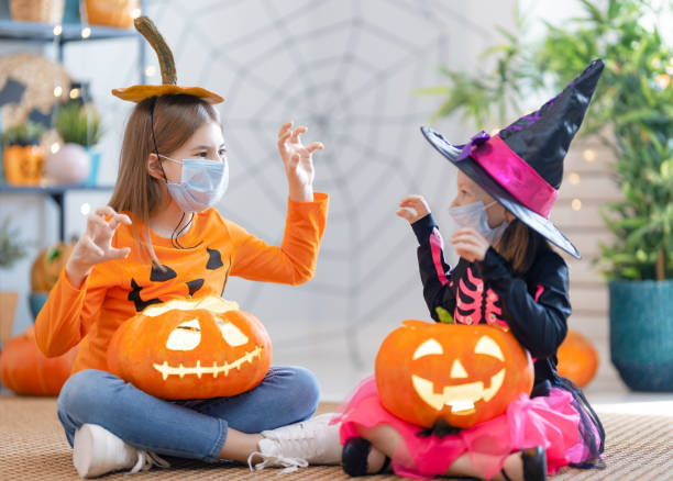 istock Happy family celebrating Halloween 1279828581