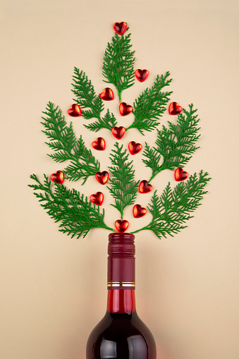 Alcoholic background, champagne without label on an atmospheric wooden background. Side view.