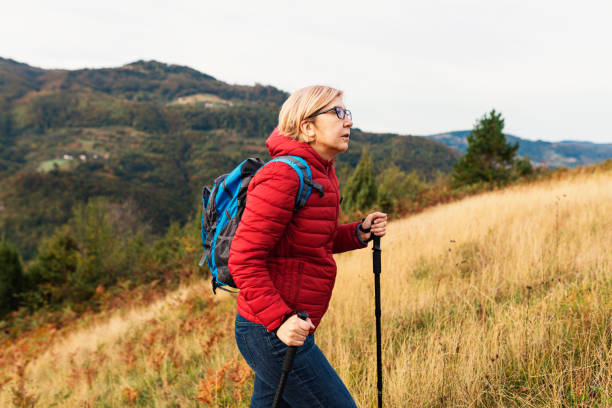 istock Mature woman out on a solo hike 1279830049