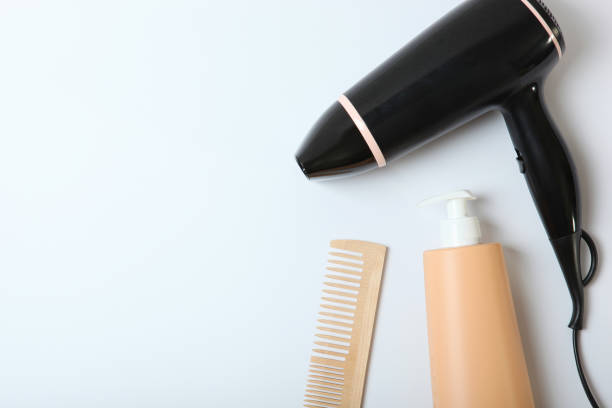 istock hair care products and a comb on the table. 1279831692