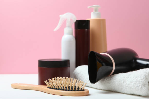 istock hair care products and a comb on the table. 1279831713