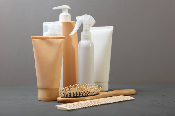 istock hair care products and a comb on the table. 1279831747