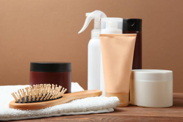 istock hair care products and a comb on the table. 1279832397