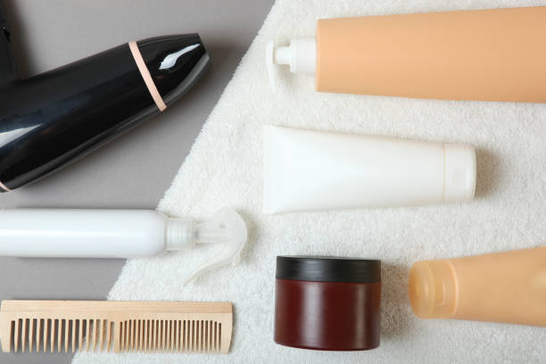 istock hair care products and a comb on the table. 1279832402