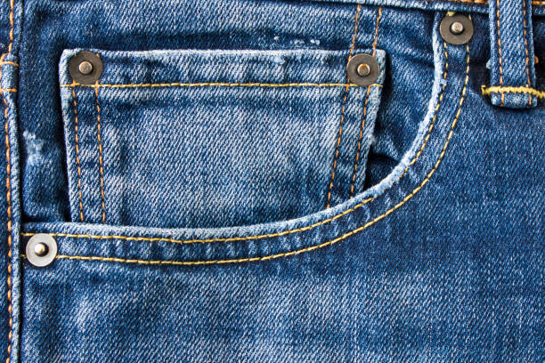 istock Denim texture. Seam on jeans. Close up. Selective focus. 1279835187
