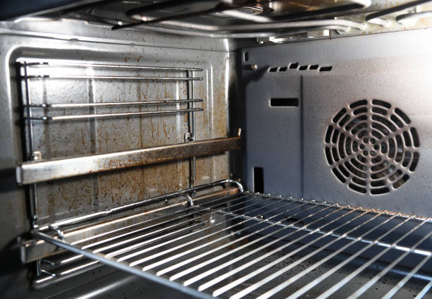 istock Dirty oven.Dirty open oven - messy kitchen, Compulsive Hoarding Syndrom 1279837515
