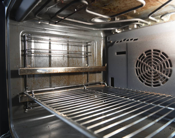 istock Dirty oven.Dirty open oven - messy kitchen, Compulsive Hoarding Syndrom 1279839382