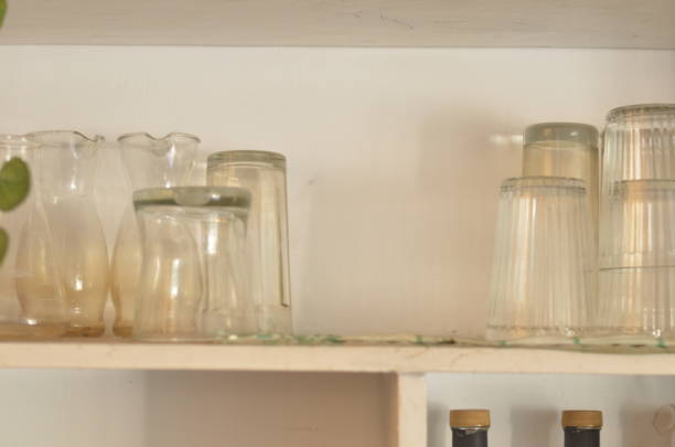 istock kitchen cabinet with clean mugs and glasses 1279839902
