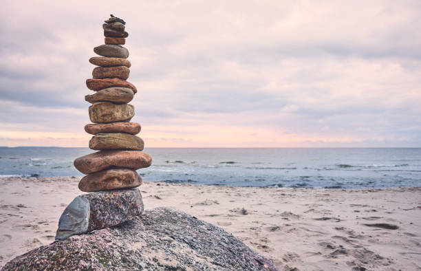 istock Stone pyramid on a beach, zen, harmony and balance concept. 1279842932