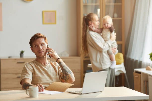 istock Father busy on the phone 1279843901
