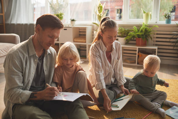 istock Parents with children at home 1279844744