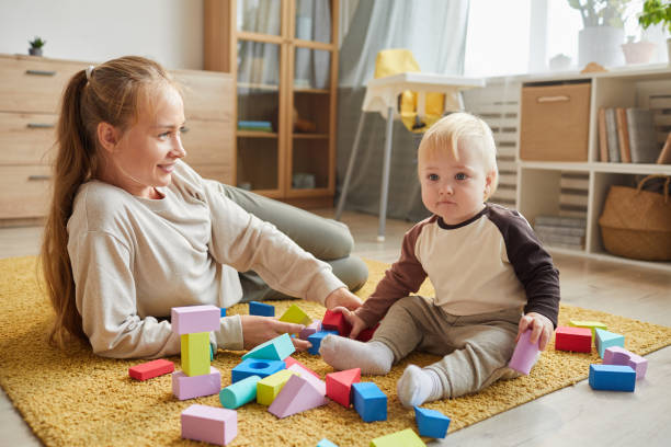 istock Mother with son at home 1279844778