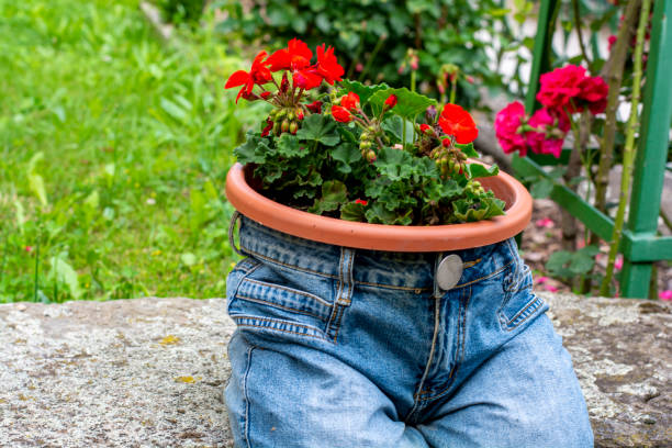 decoration from flowers in jeans trousers
