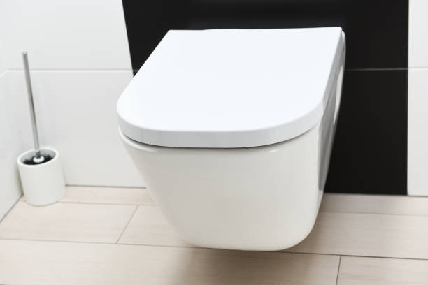 istock White toilet hanging on a black wall 1279848458